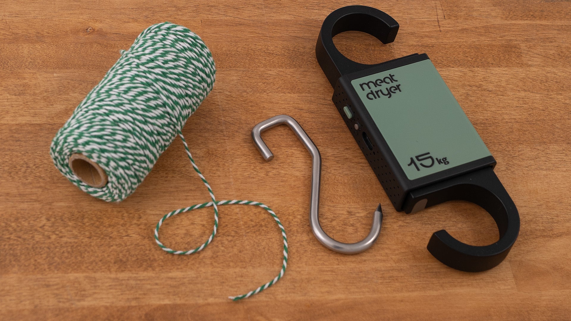 Black and green Meatdryer hook to cure meat at home with digital weight scale, temperature and humidity metering, sharp stainless steel hook