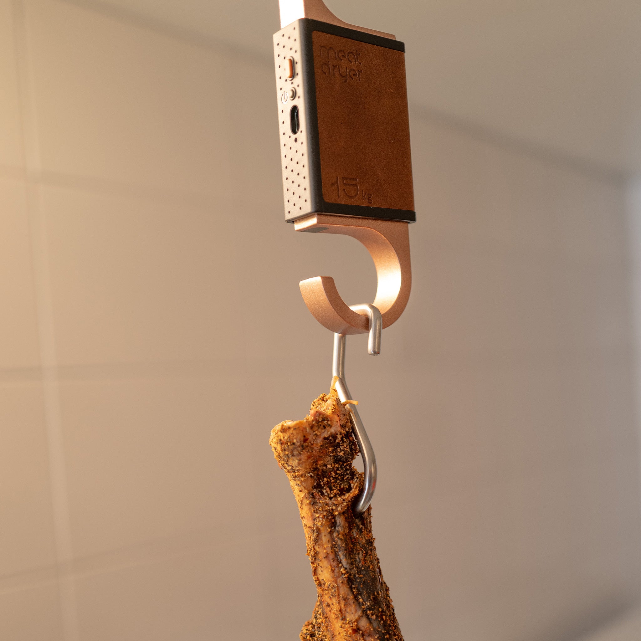 Food safe sharp stainless steel meat hook on a gray background