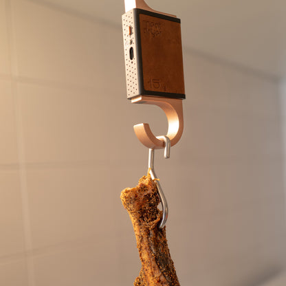 Food safe sharp stainless steel meat hook on a gray background